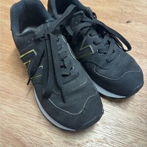 New Balance Black and Gold Sneakers
